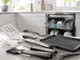 Grillzubehör aus Edelstahl vor einer Spülmaschine